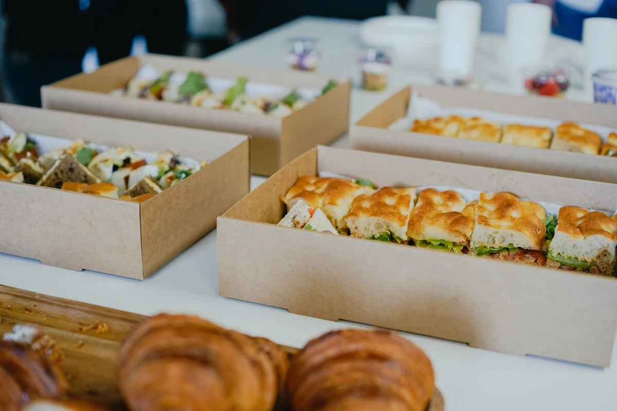Corporate lunch catering — sharing food style reference